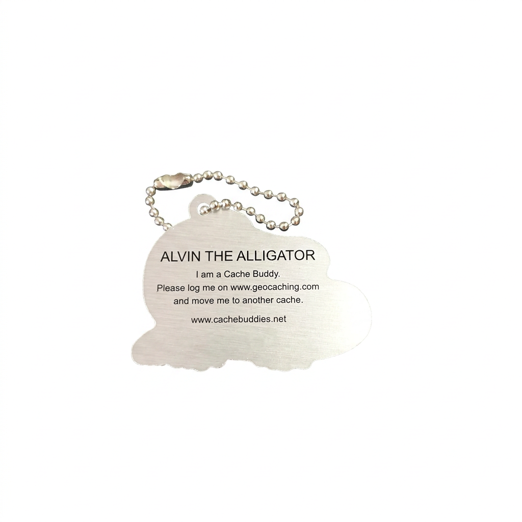 Back of Alvin the Alligator aluminium travel tag with logging instructions and tracking code removed for privacy