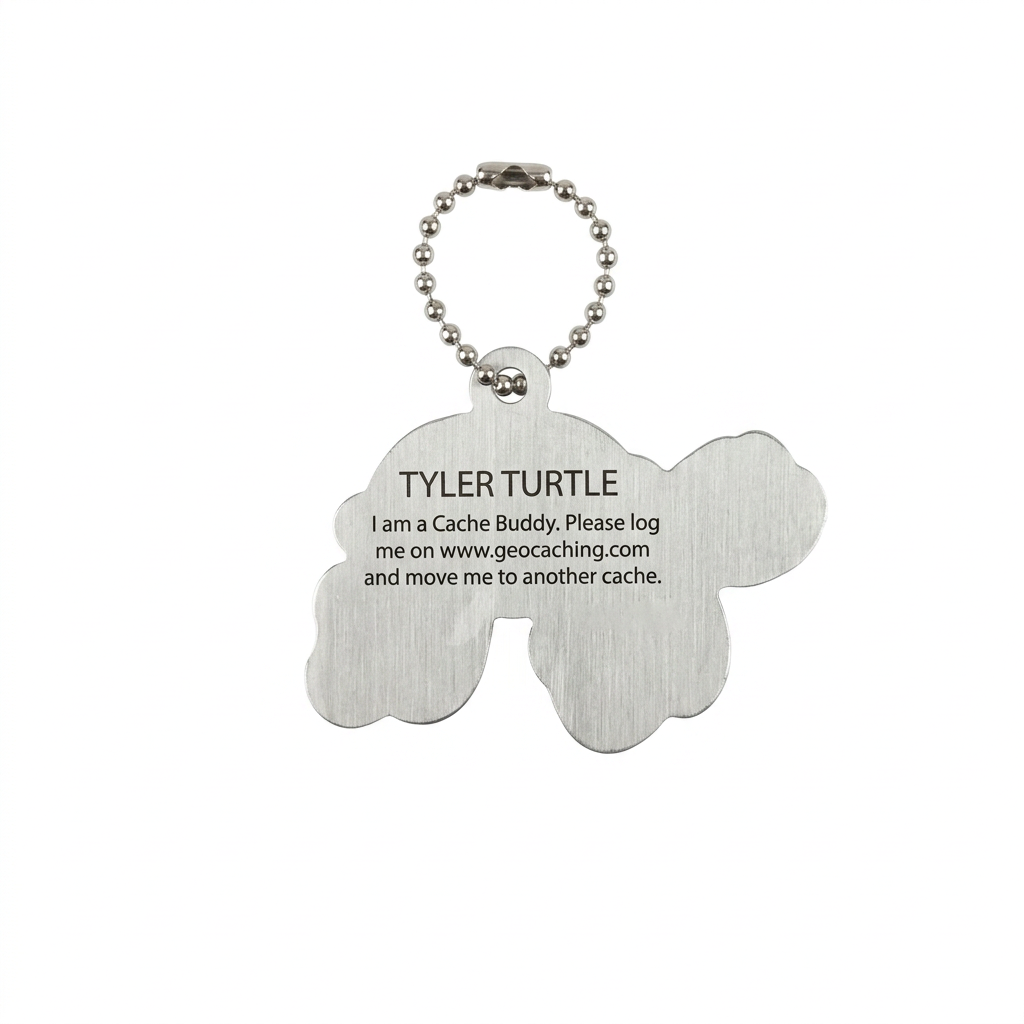 Tyler the Turtle aluminium travel tag reverse with logging instructions and unique tracking code removed