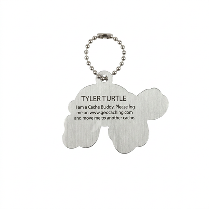 Tyler the Turtle aluminium travel tag reverse with logging instructions and unique tracking code removed