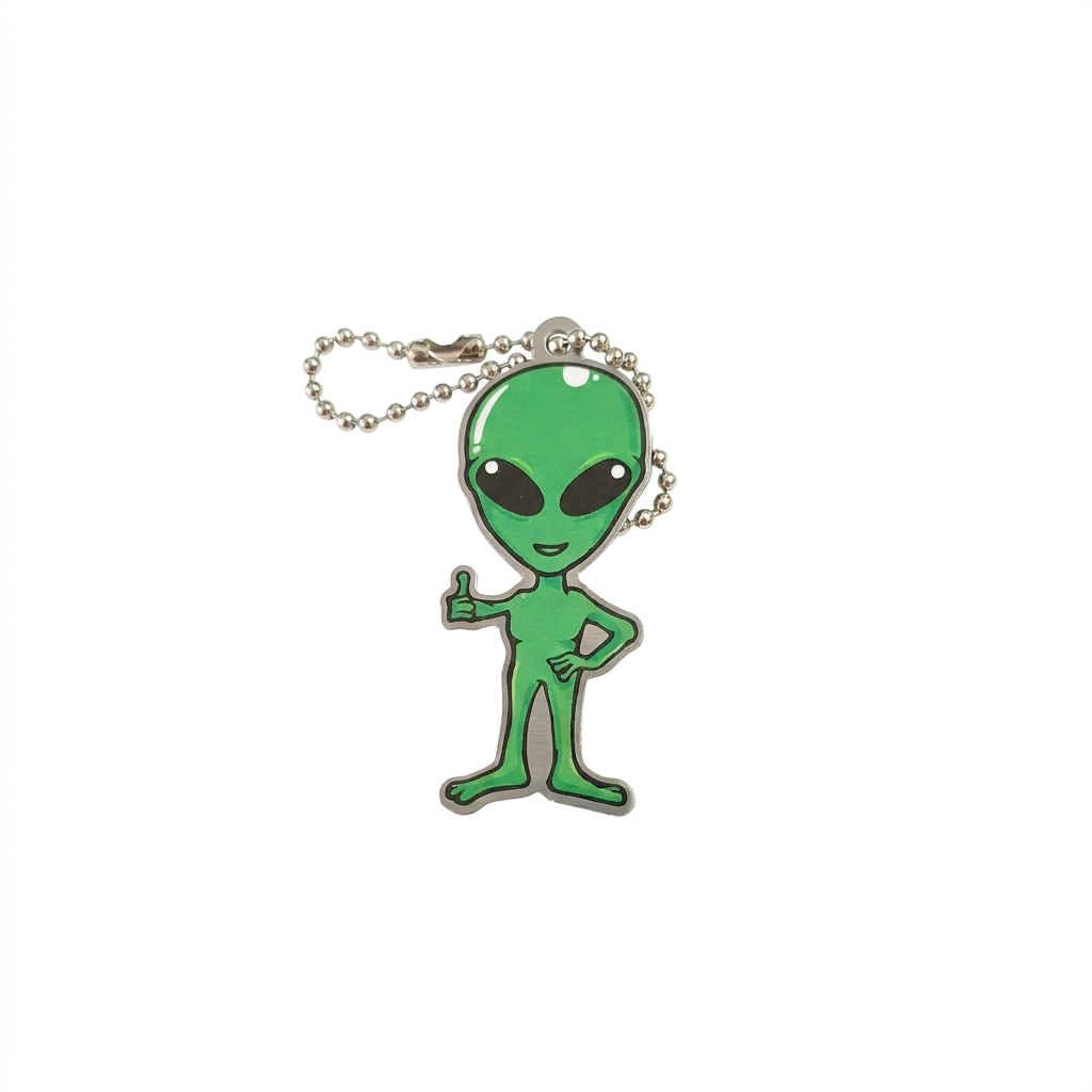 Helium the Alien green Cache Buddies travel tag giving a thumbs-up with silver ball chain