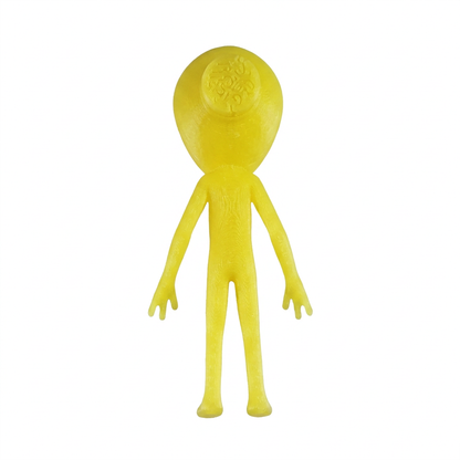 Small yellow alien rear view showing the closed head plug; digitally recoloured