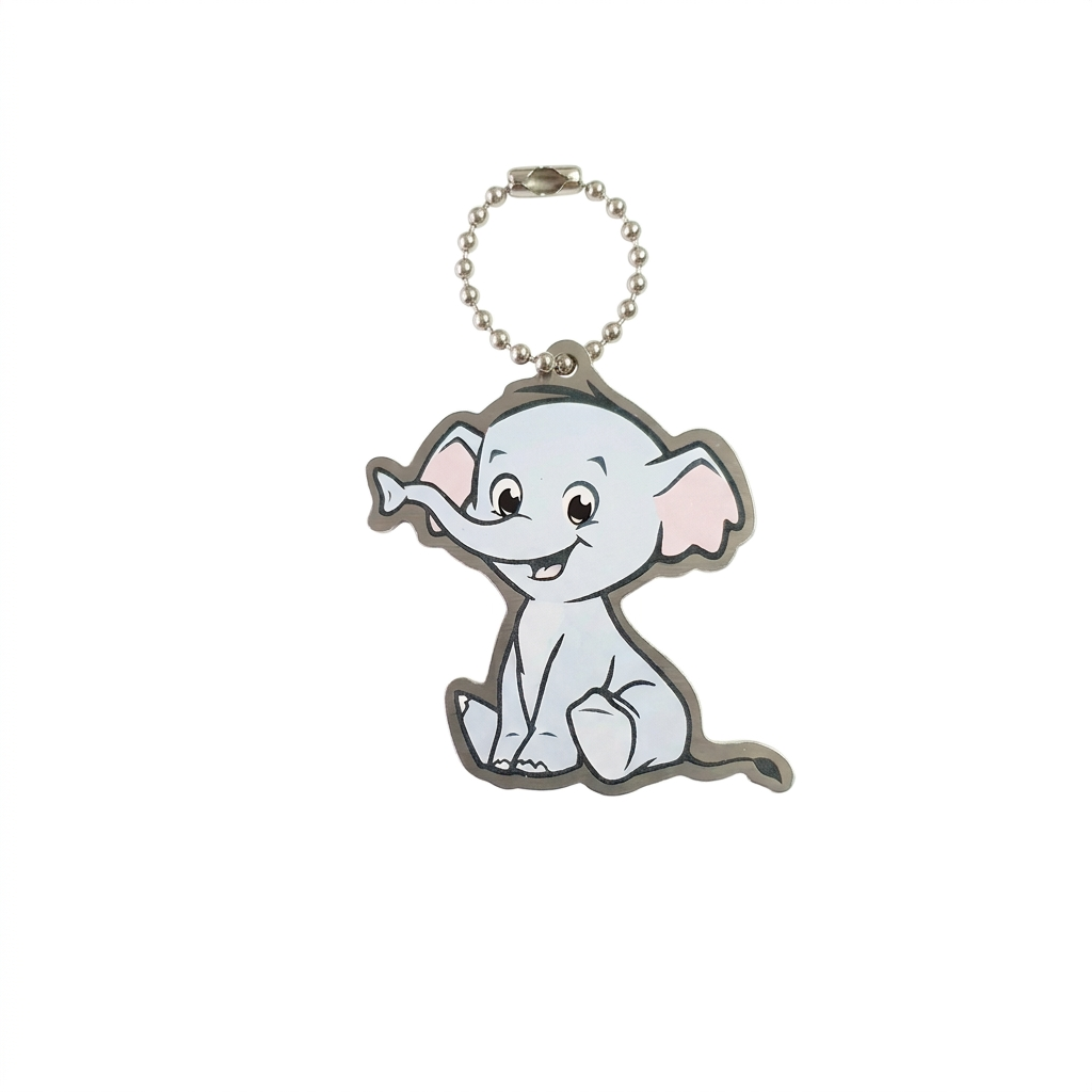 Ellie the Elephant pale blue-grey travel tag with pink ears and compact silver chain on white