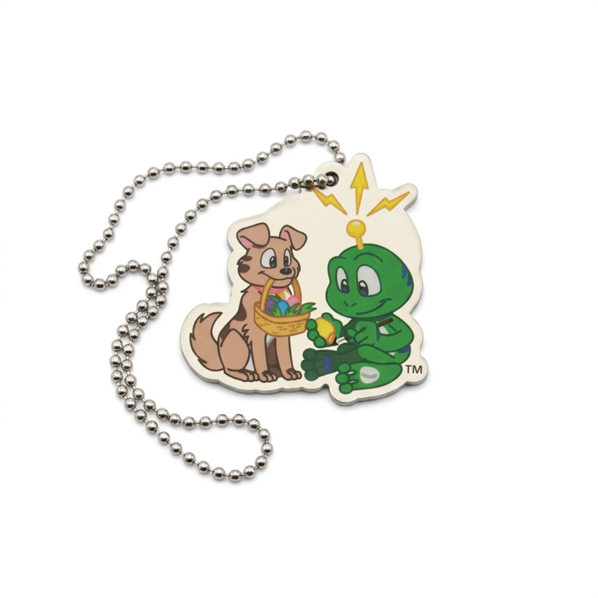 Signal the Frog and Tracker Easter travel tag showing a green frog holding an egg beside a dog with an Easter basket, with silver ball chain