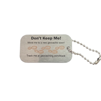 Reverse of England flag trackable tag with travelling instructions and footprints, tracking code hidden