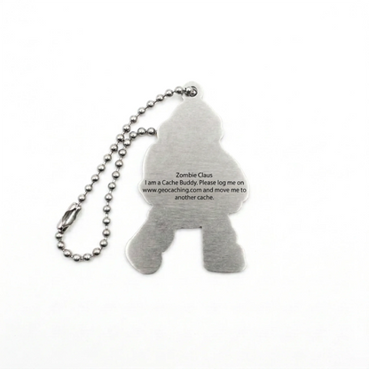 Zombie Claus Cache Buddy travel tag rear with upright logging instructions, short ball chain and unique tracking code hidden